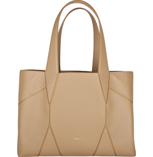 This tote from Chopard features leather panels shaped to resemble the facets of a diamond. It comes with a removable zipped pocket and closes with a magnetic clasp.